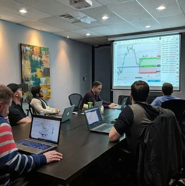 Technical team reviewing an integration in a meeting room